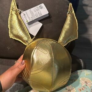 Golden Snitch, Harry Potter Loungfly crossbody bag.